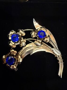 Gold-Tone Floral Brooch with Royal Blue Stones